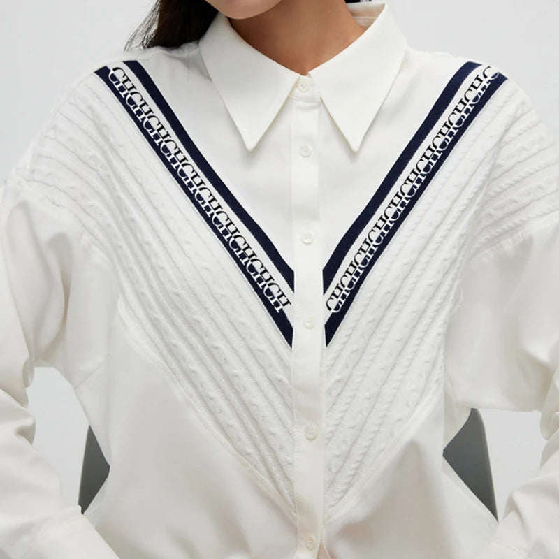 Naisten neulottu tilkkutäkki