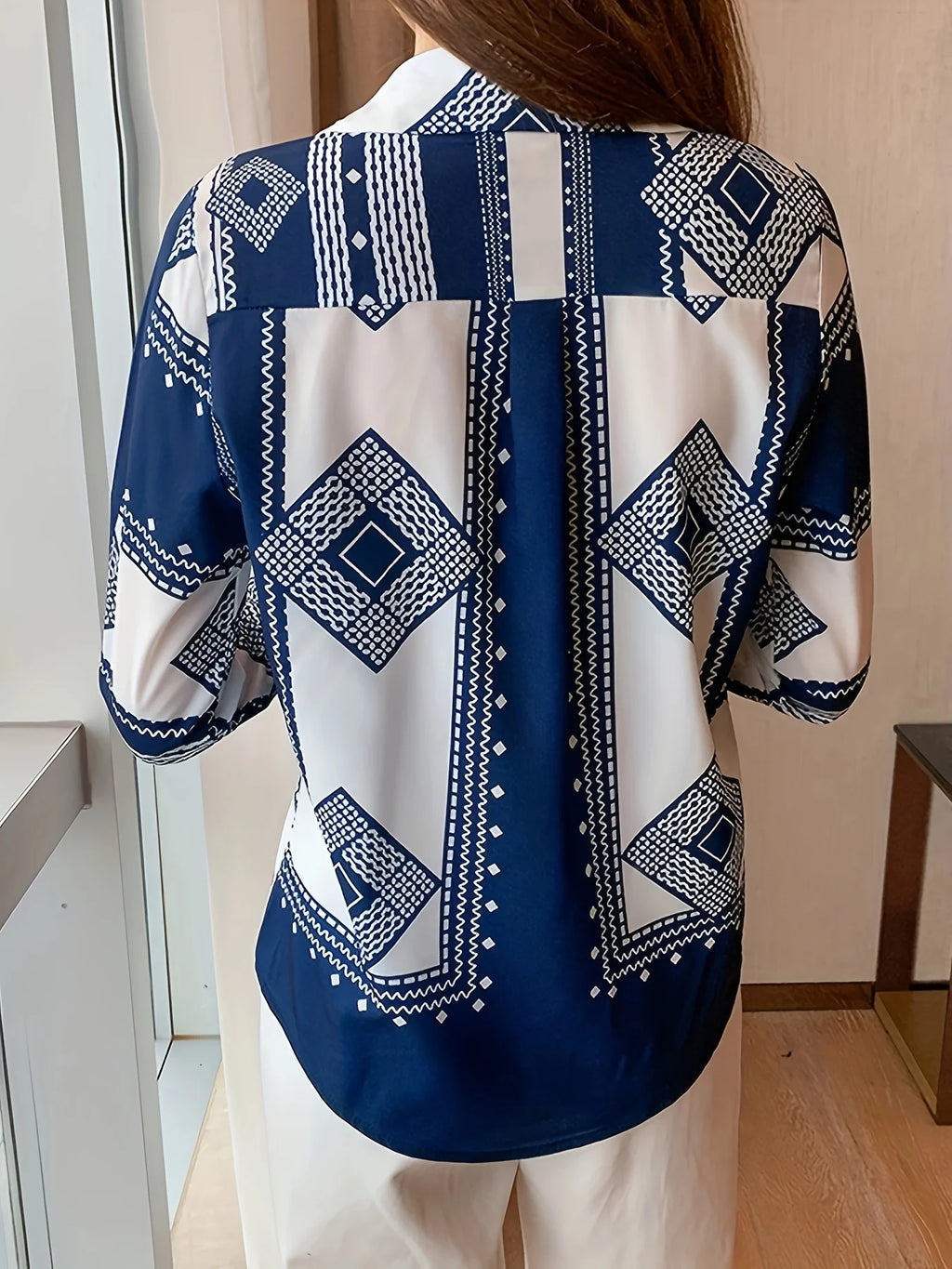 Naisten pitkähihainen napitettava toppi